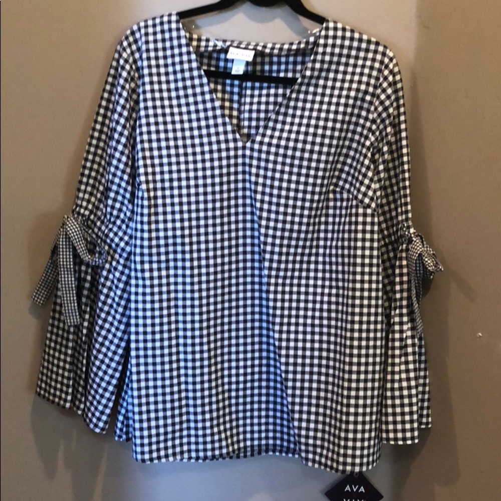 Black-and-white checkered flared blouse